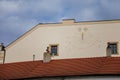 Antique sundial on the facade of a historic house, Colorful renaissance and baroque houses in medieval royal town Melnik in sunny