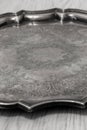 Antique tarnished silver tray with engraved pattern