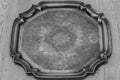 Antique tarnished silver tray with engraved pattern