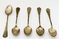 Antique tattered silver spoons Royalty Free Stock Photo