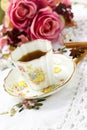 Antique tea cup on the table Royalty Free Stock Photo