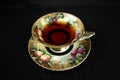 Antique teacup on black