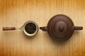 Antique teapot and a scoop with tea Royalty Free Stock Photo