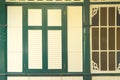 Antique Thai style green frame yellow window