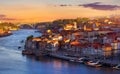 Antique town Porto, Portugal. Sunset sun over silhouettes Royalty Free Stock Photo