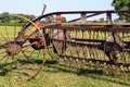 Antique tractor drawn windrower farm implement Royalty Free Stock Photo