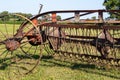 Antique tractor drawn windrower farm implement