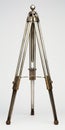 Antique Tripod In The Style Of Haroon Mirza - Silver And Gold Royalty Free Stock Photo