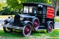 An antique truck carries an old advertisement - 2