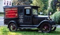 An antique truck carries an old advertisement - 3