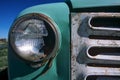 Antique truck grille and broken headlight Royalty Free Stock Photo