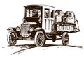 Antique truck transporting cargo, in three-quarter view