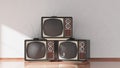 Antique TV sets on wooden floor,
