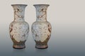 Antique two big cream and black ceramic vases on gradient grey background, object, decor, retro, gift, fashion, copy space Royalty Free Stock Photo