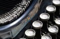 Antique typewriter from beginning 20th century at industry exhibit in an art gallery