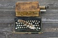 Antique typewriter with old book Bible and bird feather