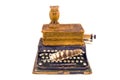Antique typewriter with owl and old book isolated on white Royalty Free Stock Photo