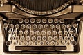 Antique typewriter on sepia Royalty Free Stock Photo