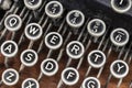 Antique typewriter showing traditional QWERTY keys. Before text messaging, people used typewriters to communicate by writing