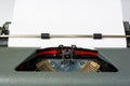 Antique Typewriter on White Background with Paper Close Up Royalty Free Stock Photo