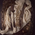 Antique, vinage cuterly on silver tray with napkin Royalty Free Stock Photo