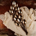 Antique, vinage cuterly spoons on silver tray with napkin Royalty Free Stock Photo