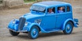 Antique Vintage Blue Car with Blue Wheels Royalty Free Stock Photo