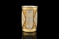 Antique Vintage Brass Shot Glass Gilded on Black background