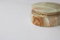 Antique vintage casket of green onyx with gold jewelry on a white background. text space