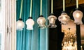 Antique vintage chandeliers with lamps inside, retro exterior detail.