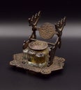 Antique Bronze Inkwell on Black Background