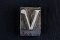 Antique vintage movable type alphabet letter V Royalty Free Stock Photo