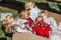 Antique and vintage porcelain or plastic dolls at flea market