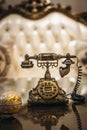 Antique Vintage rotary old hang up telephone model with Beautifully embossed gold bronze texture in retro style. Old