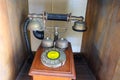 An antique and vintage telephone