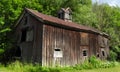 Antique vintage wooden barn set in countryside
