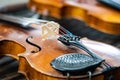 Antique violin and violin bow lying on dulcimer. Close up a violin instrument and cymbal before a concert