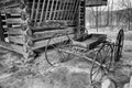 Antique wagon parked in timber framed log barn Royalty Free Stock Photo