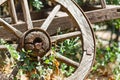 Antique wagon wheel at the courtyard farmhouse Royalty Free Stock Photo