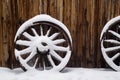 Antique Wagon Wheels in Snow Royalty Free Stock Photo