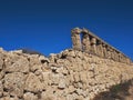 An antique water pipe handmade of porous tuff stone, a high aqueduct