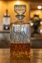 Antique whiskey bottle on top of bar counter. Royalty Free Stock Photo