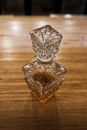 Antique whiskey bottle on top of bar counter. Royalty Free Stock Photo