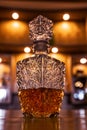 Antique whiskey bottle on top of bar counter. Royalty Free Stock Photo