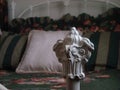 Antique white metal bedpost