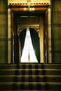 Antique window in the castle with long curtains