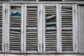 Antique windows, worn out by the weather.