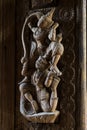 Antique wood carving in the form of deities Royalty Free Stock Photo