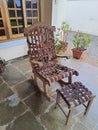 Antique wood and leather rocking chair with footrest, isolated . Royalty Free Stock Photo