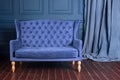 Antique wood sofa couch in vintage room. Classical style armchair. Royalty Free Stock Photo